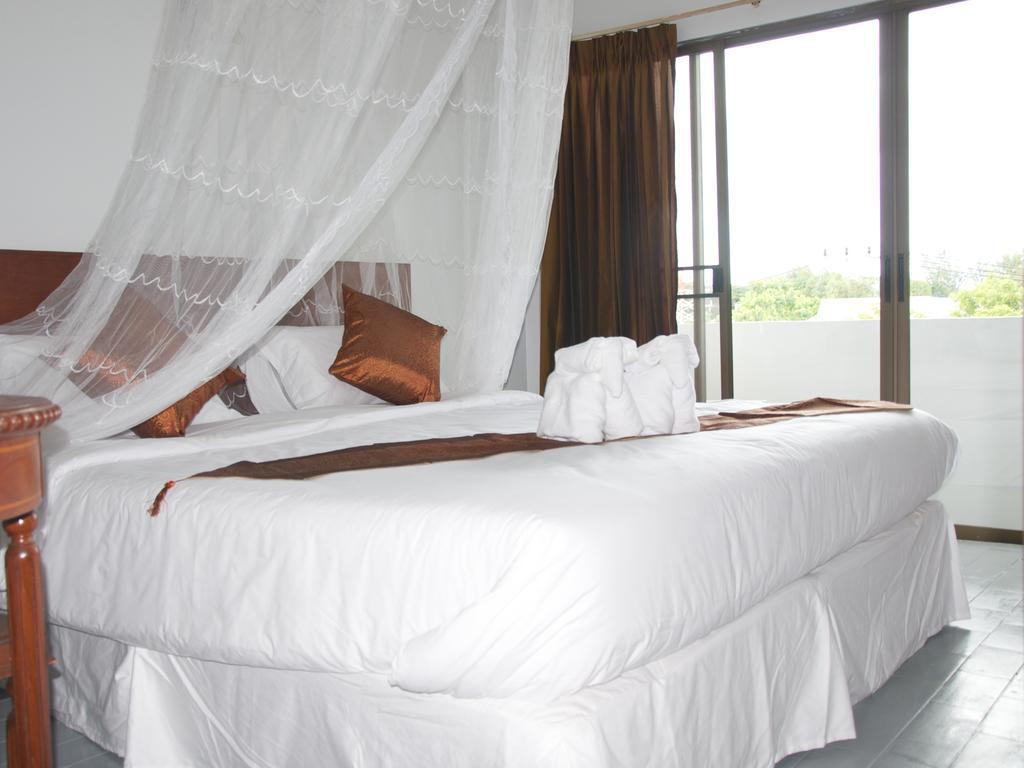 Palada Guesthouse HHQ Quarto foto
